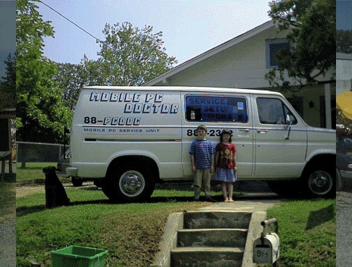KC and Nikki standing in front of the Mobile PC Doctor family-business van