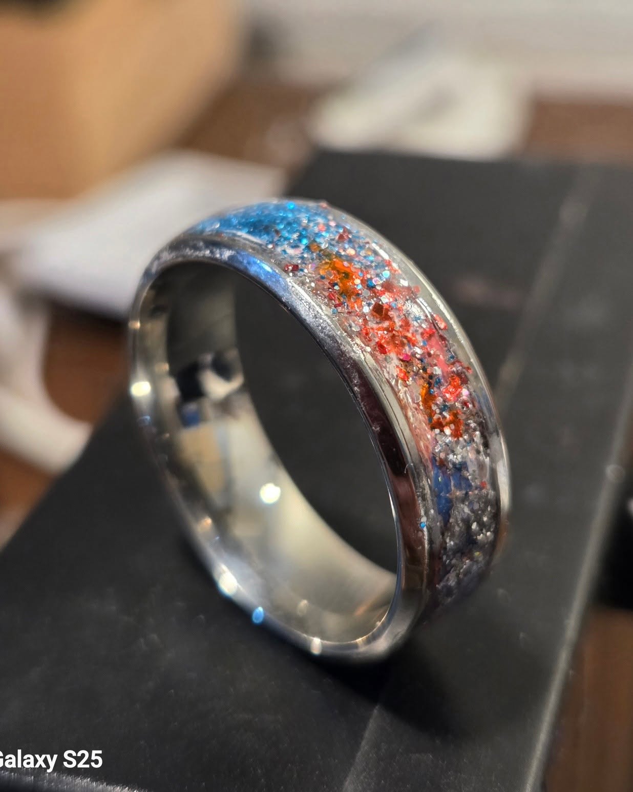 Close view of a multicolor glitter resin ring